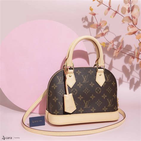 louis vuitton logo beige|louis vuitton alma bb bag.